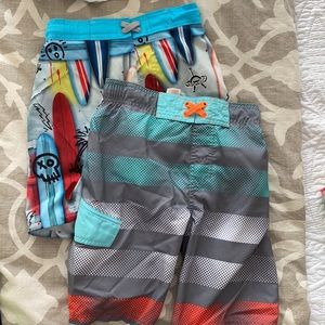 2 pairs of boys swim trunks
